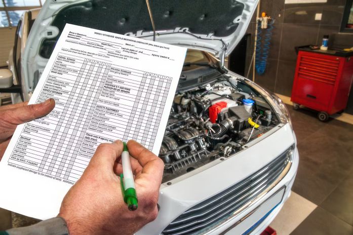 licensed mobile mechanic inspecting car for roadworthy certificate Melbourne